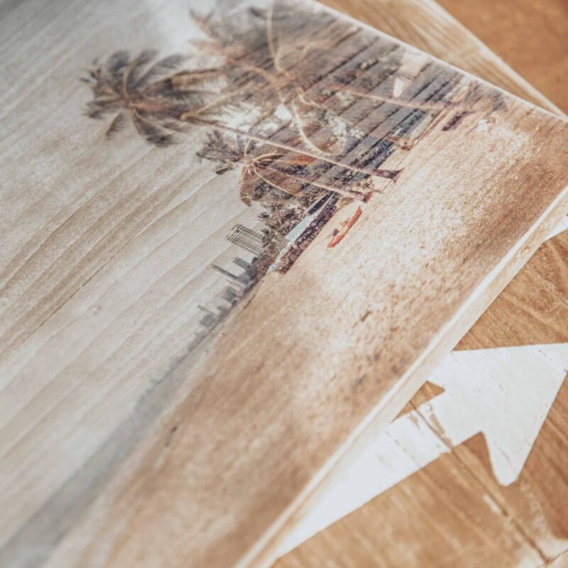 Direct print on reclaimed wood showing a detailed image with natural wood grain texture.