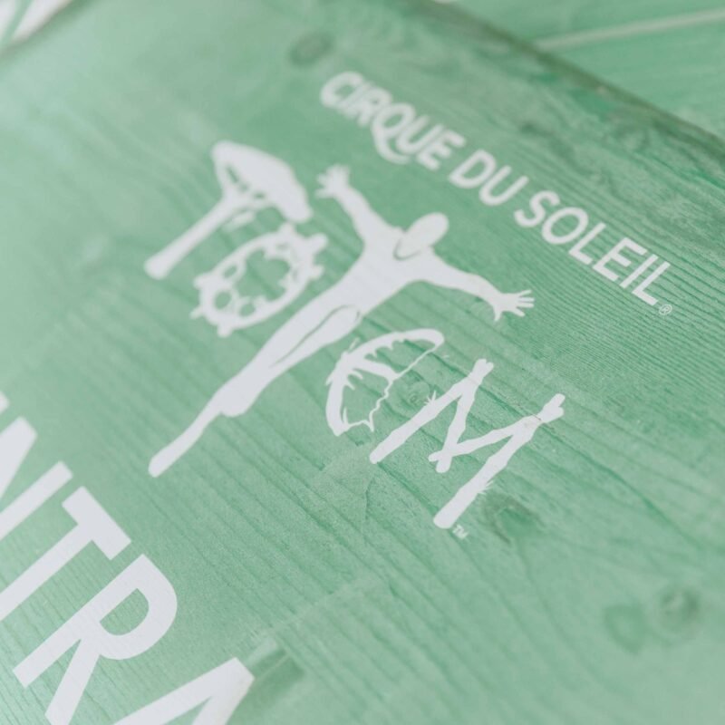 Reclaimed wood entrance sign created for a Cirque du Soleil event, featuring UV direct print on aged timber.